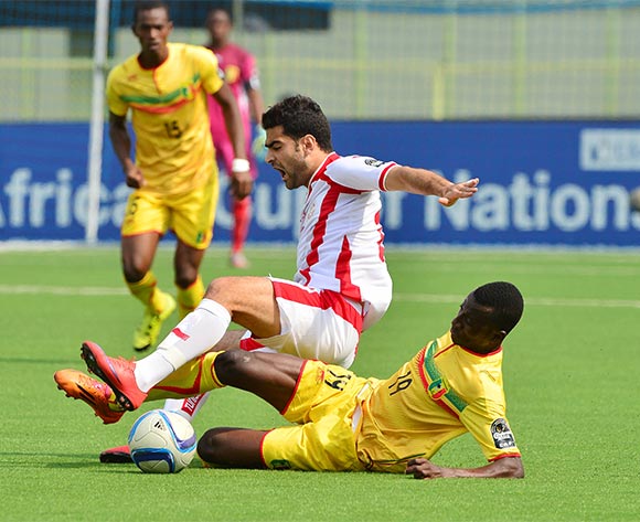 Hamza Mathlouthi of Tunisia fouled by Abdoulaye Diarra of Mali during the 2016 CHAN quarterfinal football match between Tunisia and Mali at the Stade de Kigali in Kigali, Rwanda on 31 January 2016 ©Gavin Barker/BackpagePix